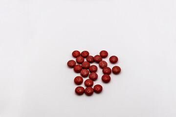 Red chocolate isolated on white background.