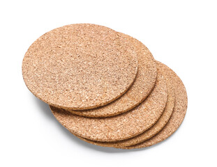Wooden drink coasters isolated on white background