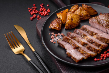 Delicious juicy pork or beef steak grilled with salt, spices and herbs