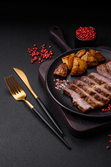 Delicious juicy pork or beef steak grilled with salt, spices and herbs