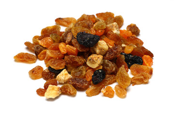 Mix of nuts and dried fruits isolated on a white background.