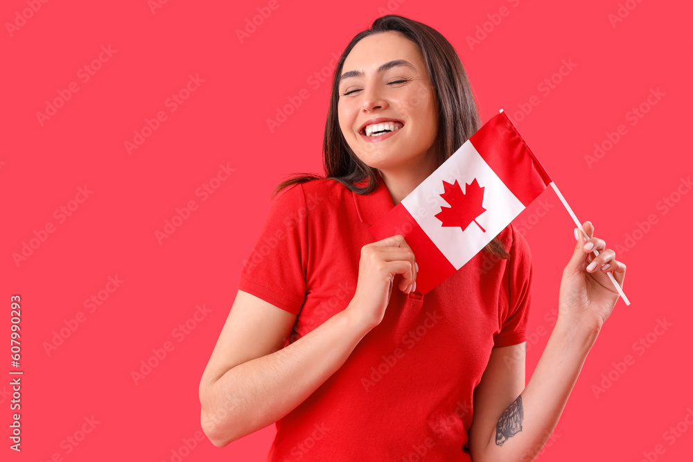 Poster Young woman with flag of Canada on red background