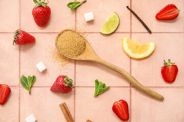 Ingredients for preparing strawberry compote on pink tile background