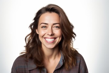 Fototapeta premium Portrait of a beautiful young woman smiling, isolated on white background