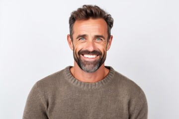 Obraz premium Portrait of a handsome middle-aged man smiling at the camera
