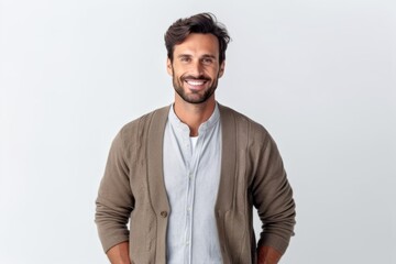 Fototapeta premium Portrait of handsome man smiling and looking at camera over white background