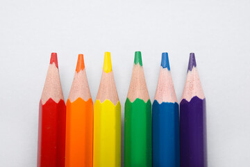 Colorful pencils on light background, closeup. LGBT concept