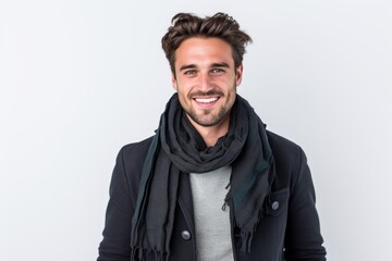 Obraz premium Portrait of a handsome young man smiling and looking at the camera