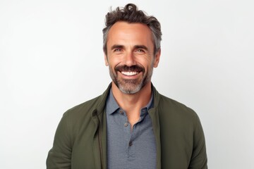 Portrait of a handsome middle-aged man smiling against white background