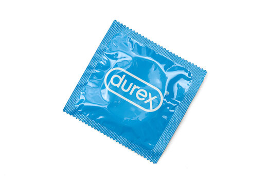 Single blue original Durex condom preservative isolated on white background
