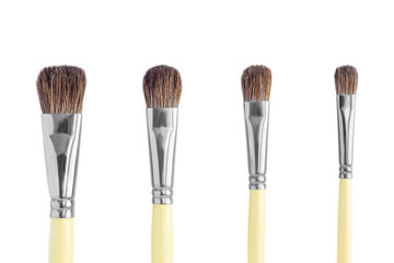 Art brushes on a white background. Close-up.