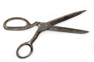 Old and rusty retro dressmaking scissors isoilated on white background. Traditional fashion equipment 