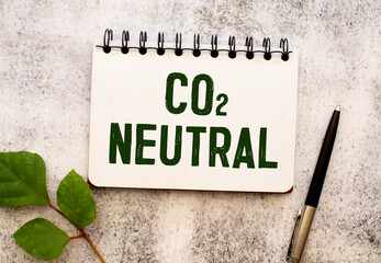 Label with text: CO2 Neutral. on white paper