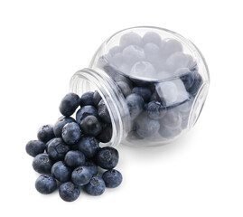 Glass jar with ripe blueberry on white background