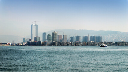 Naklejka premium Beautiful view on the sea coast and modern cityscape of city Izmir, Turkey