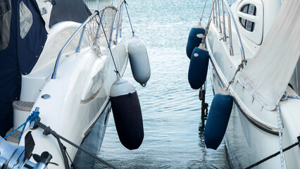 Fender and buoys on the boards of modern yachts or ships