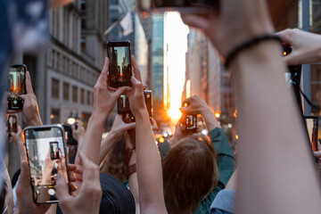 City Crowd with Cameras Sunset