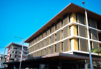 a photograph of a stylish modern higher education building located in the waterfront precinct in...