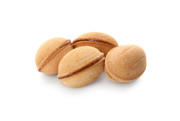 Delicious nut shaped cookies with boiled condensed milk on white background