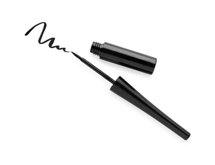 Black eyeliner and stroke on white background, top view. Makeup product