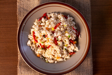 fried rice food from asia, fried rice served on a plate, top view