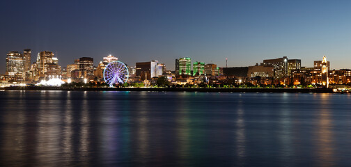 Montreal skyline and St Lawrence River at night, Quebec, Canada
