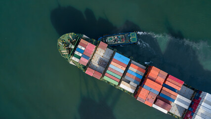 Fototapeta premium Aerial view container cargo ship, Global business import export logistic and transportation freight shipping of international by container cargo ship, Container cargo vessel freight shipping.