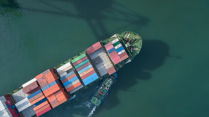 Fototapeta premium Aerial view container cargo ship, Global business import export logistic and transportation freight shipping of international by container cargo ship, Container cargo vessel freight shipping.