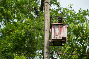 old transformer with electric pole
