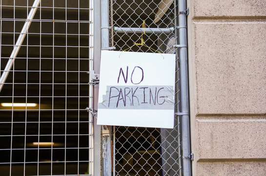 No parking sign signifies restriction, prohibition, enforcement, and the designated areas where parking is not allowed