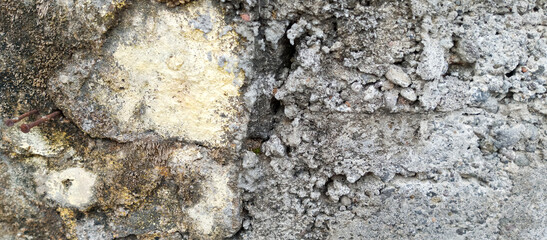 The texture of the stone wall in the cement background of the stone wall, taken at close range