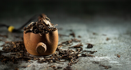 tea utensils and dried leaf tea