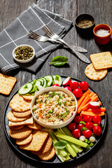 salmon salad with fresh veggies and crackers