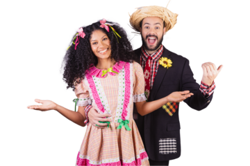 Couple wearing typical clothes of Festa Junina, Arraial, Festa de São João. with open arms, inviting.