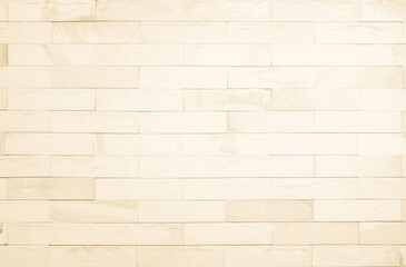 Empty background of wide cream brick wall texture. Beige old brown brick wall concrete or stone textured, wallpaper limestone abstract.	