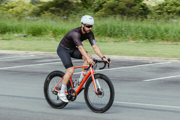 Fototapeta premium man riding a bike