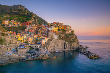 Fototapeta na wymiar Colorful cityscape of buildings over Mediterranean sea, Europe, Cinque Terre in Italy