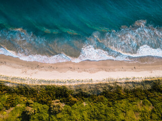Aerial view of calm beach located at Fisherman's beach, Port Kembla, NSW, Australia