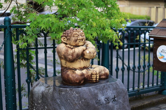Kinugawa, Japan, May 3 2023: a oni statue in Kinugawa Onsen.  An oni is a kind of demon, orc, ogre, or troll in Japanese folklore. 