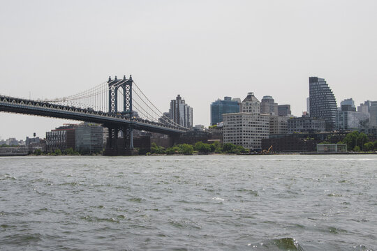 Manhattan Bridge Crossing The River Of New York