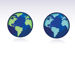 two different color globes of the world isolated over a white background.