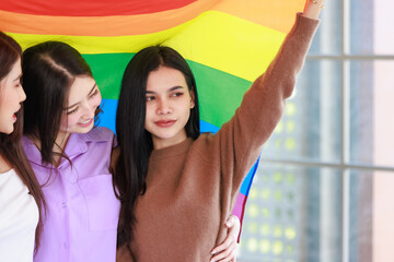 Millennial three Asian beautiful pretty female lesbian girlfriends lover in casual outfits sitting...