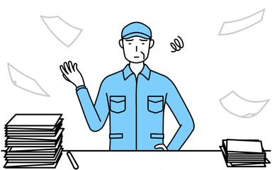 片付かない業務にうんざりする帽子と作業着姿のシニア男性（経営者、管理職、上司）