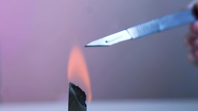 Scalpel And Forceps Sterilization With Fire