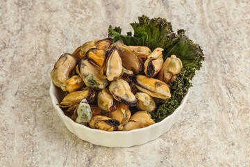 Tasty marinated mussels in the bowl