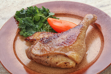 Roasted duck leg with orange sauce