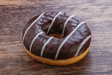 Glazed sweet tasty chocolate donut
