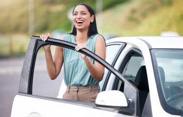 Excited, woman and outdoor with happiness driving her new car on a road for commute. Female person,...