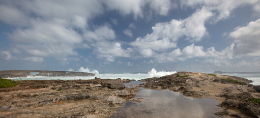 Storm waves crashing into Laie Point coastline at Kaawa on the North Shore of Oahu Hawaii United States