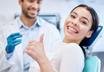 Happy, thumbs up and portrait of dentist and patient for teeth whitening, service and dental care. Healthcare, dentistry and hand sign of orthodontist and woman for oral hygiene, wellness or cleaning